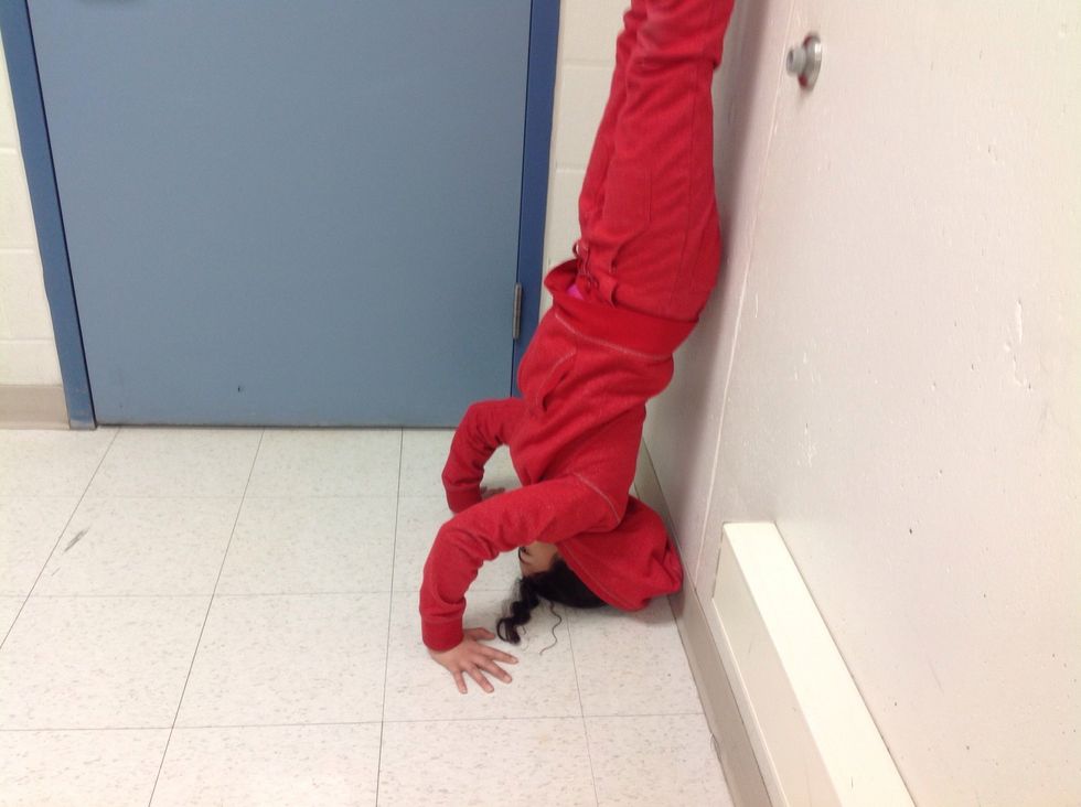 Push your other foot off the ground. Lift both legs up so that they are parallel to each other.