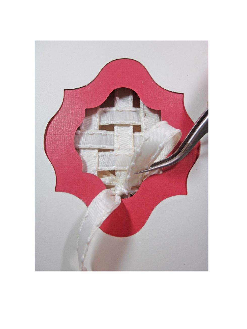 Push your tails back to the front of your card.