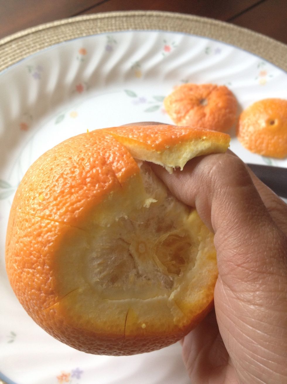 Push your thumb through the separation and down all the way to the other end
