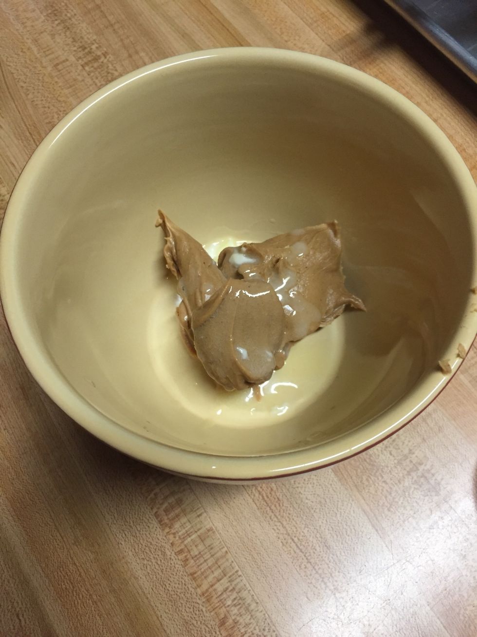 Put 1/2 cup of melted butter into the bowl.