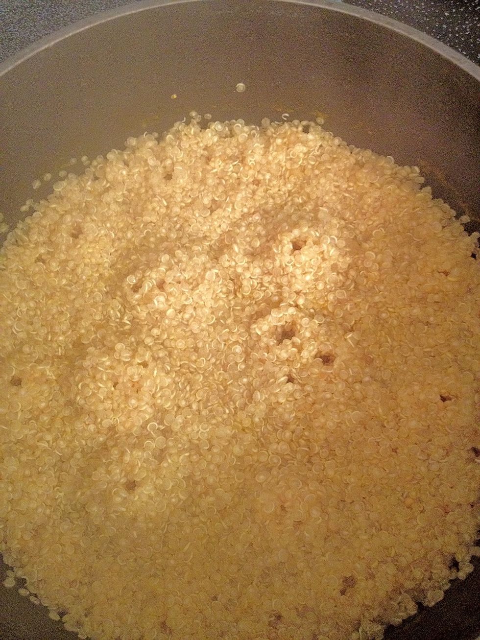 Put 1 cup rinsed (or toasted in a skillet) quinoa w/ 2 cups broth (or water & broth) in a pot and bring to a boil, cover & simmer about 15 minutes till translucent. Cooks like rice no need to drain.