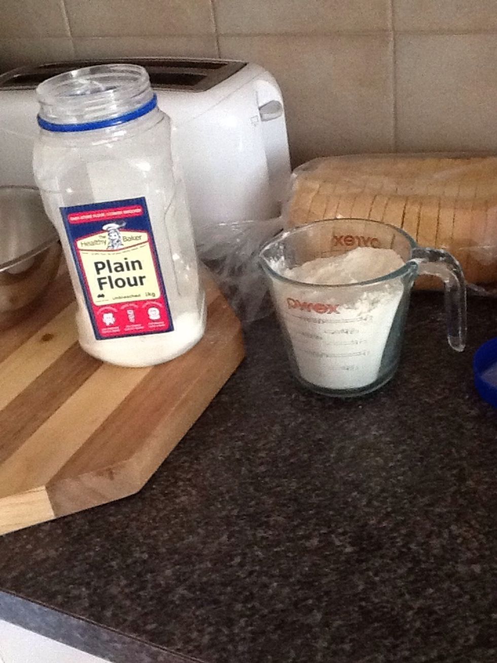 Put 2 cups of plain flour into a bowl.