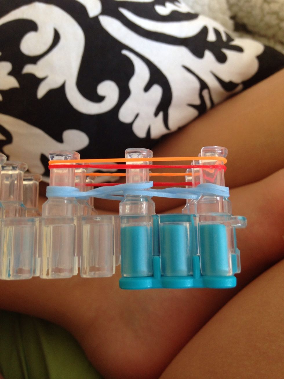 Put 2 different colored bands over the others