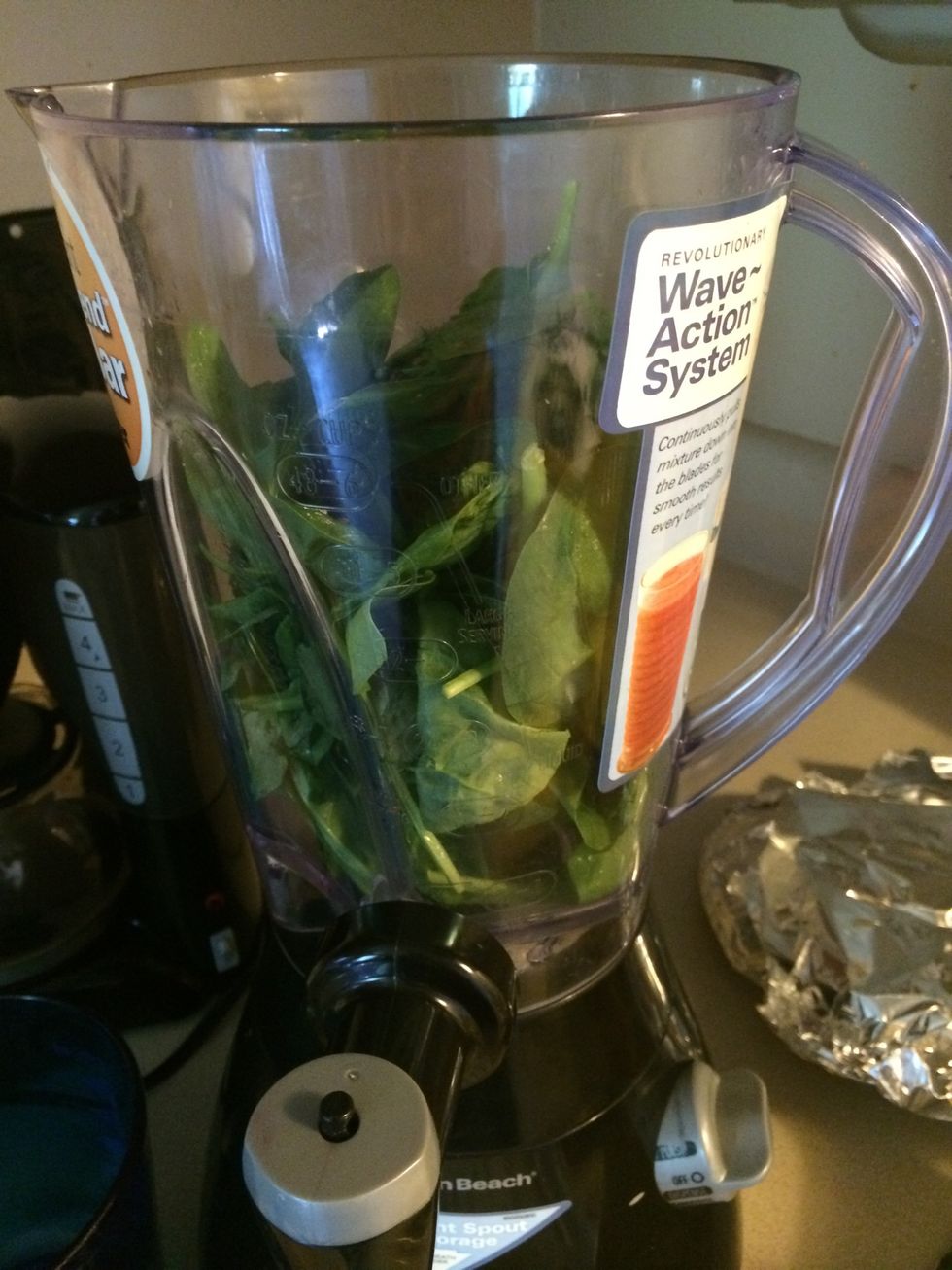 Put 2 handfuls of spinach in the blender