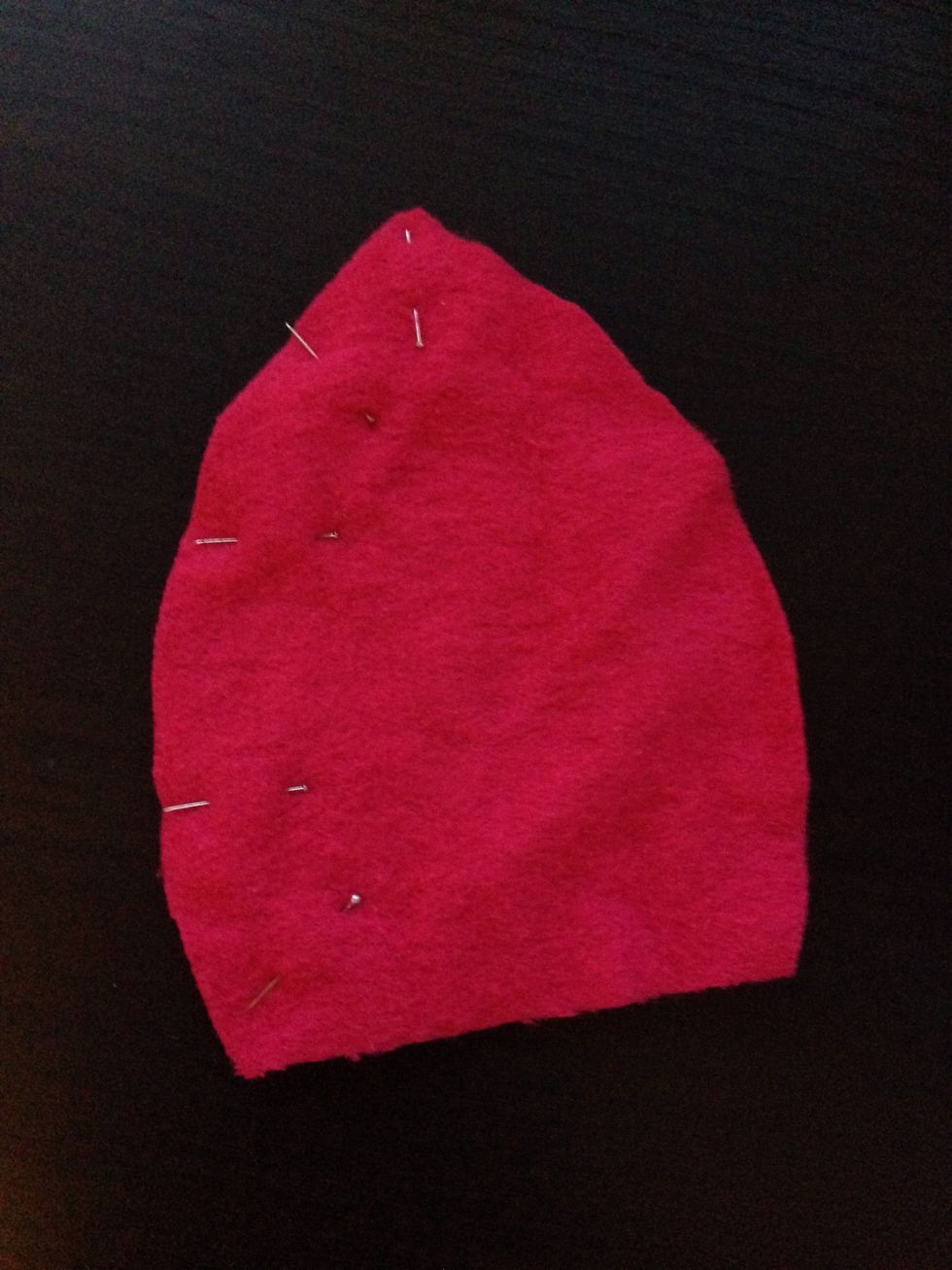 Put 2 of the triangle ones with the backside together and pin them together on one side