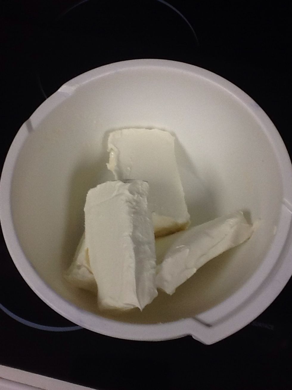 Put 2 pounds of cream cheese in a large mixing bowl