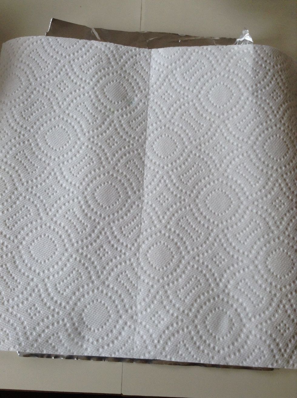 Put 2 sheets of paper towel on a sheet of tin foil