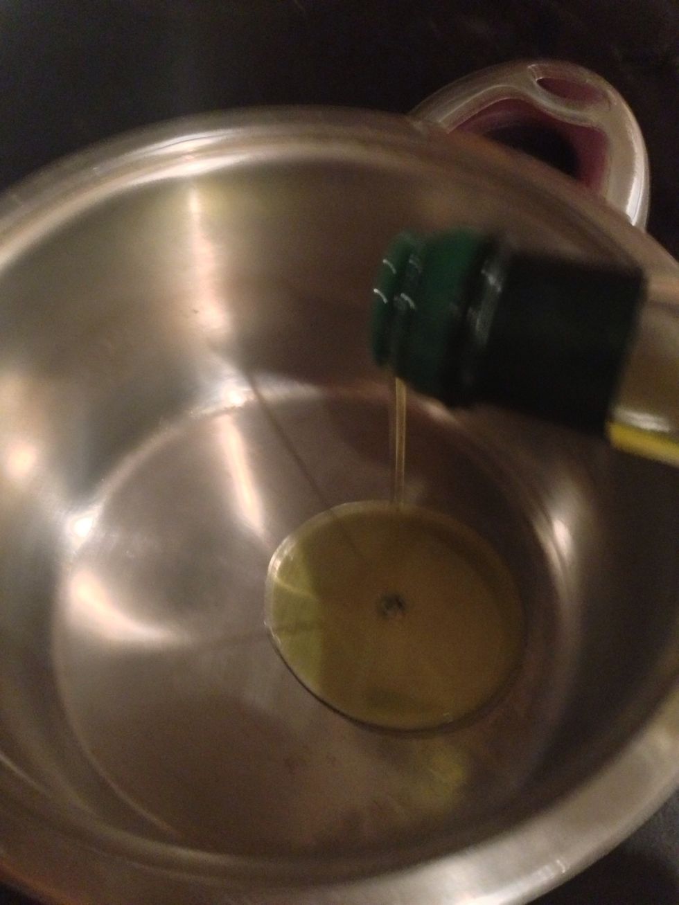 Put 2 table spoon of olive oil in the pot over medium heat.