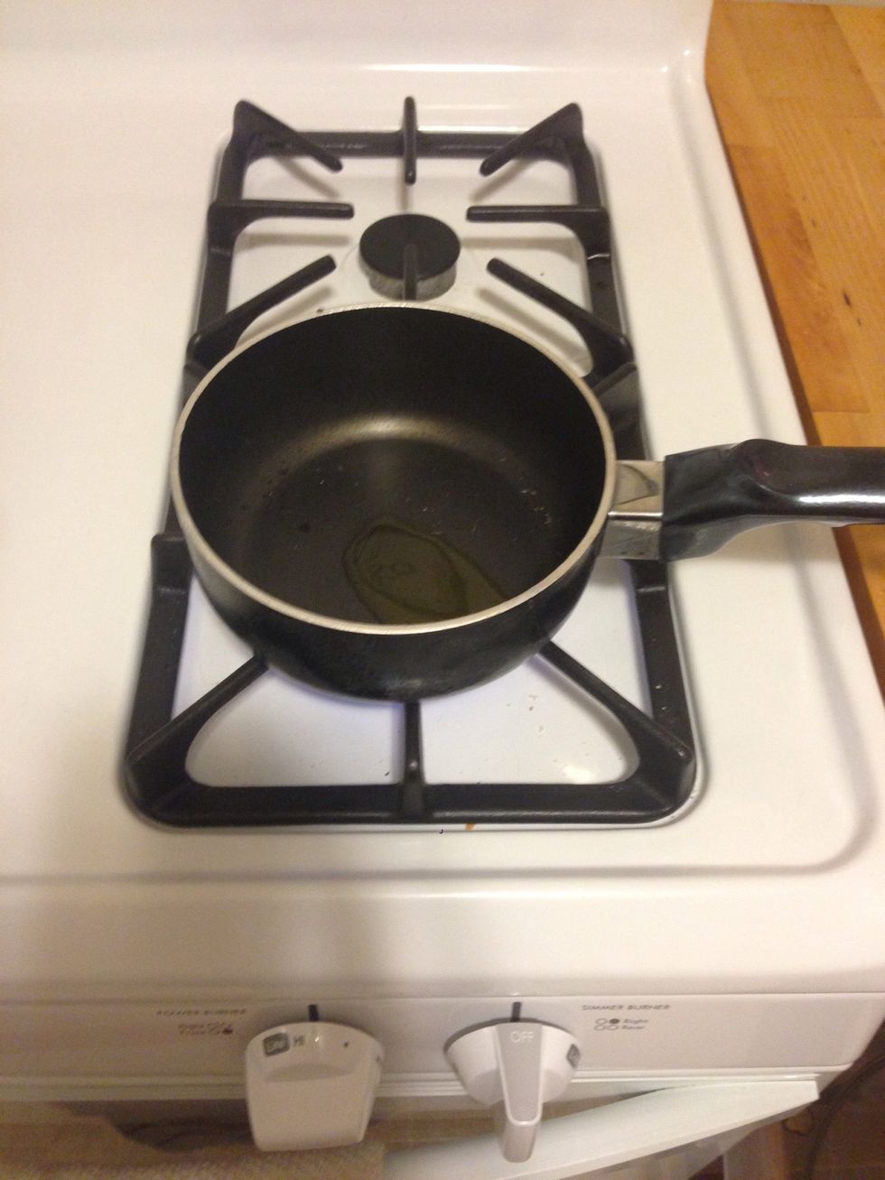 Put 2 tsp olive oil in a pan on high heat.