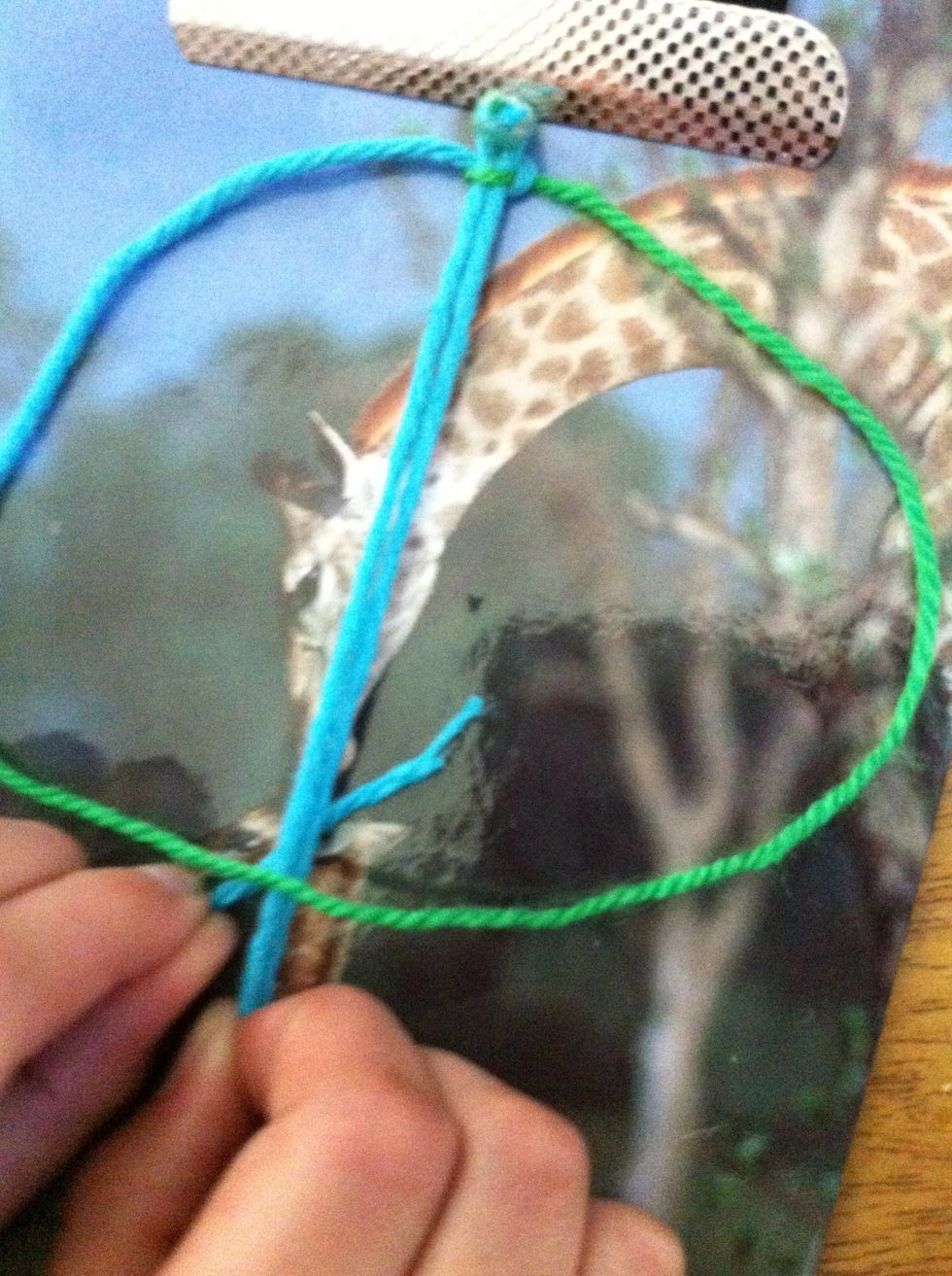 Put 2 under the base yarn and into loop 1. Look closely. *Sorry for the blur*