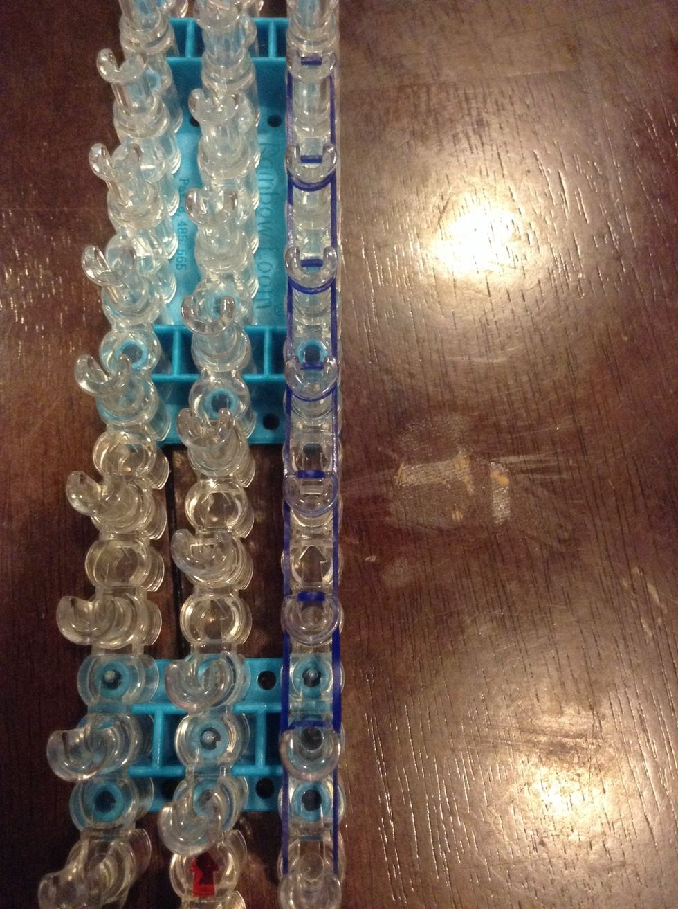 Put 5, 6, or 7 rubber bands on the loom. When done, turn the loom around