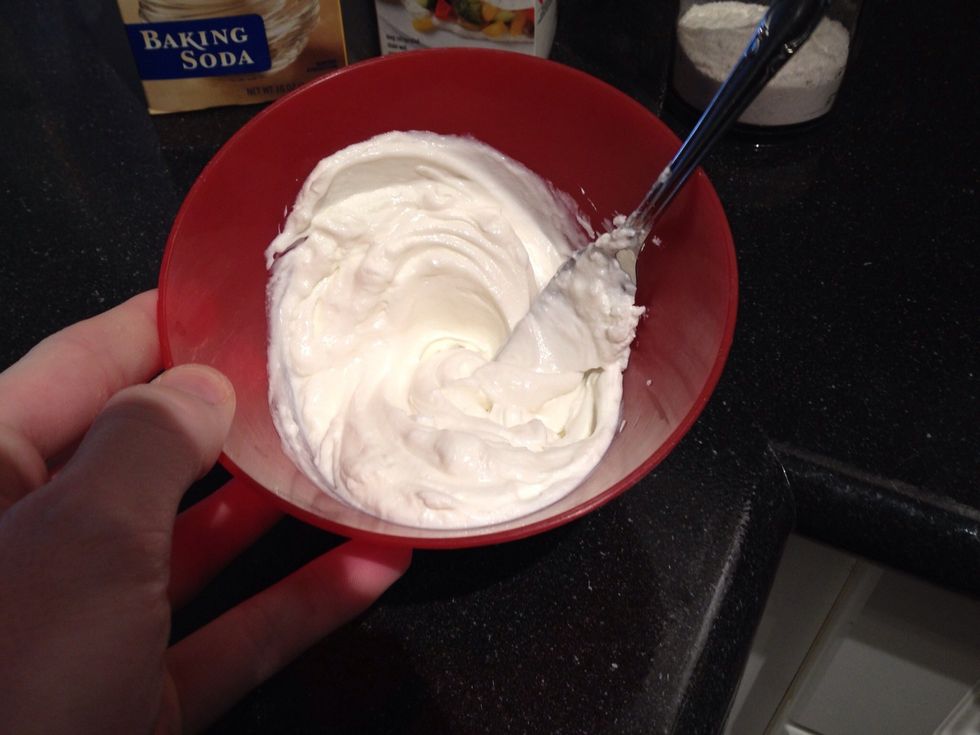 Put 6 ounces of greek yogurt into bowl and whisk a bit until creamy.