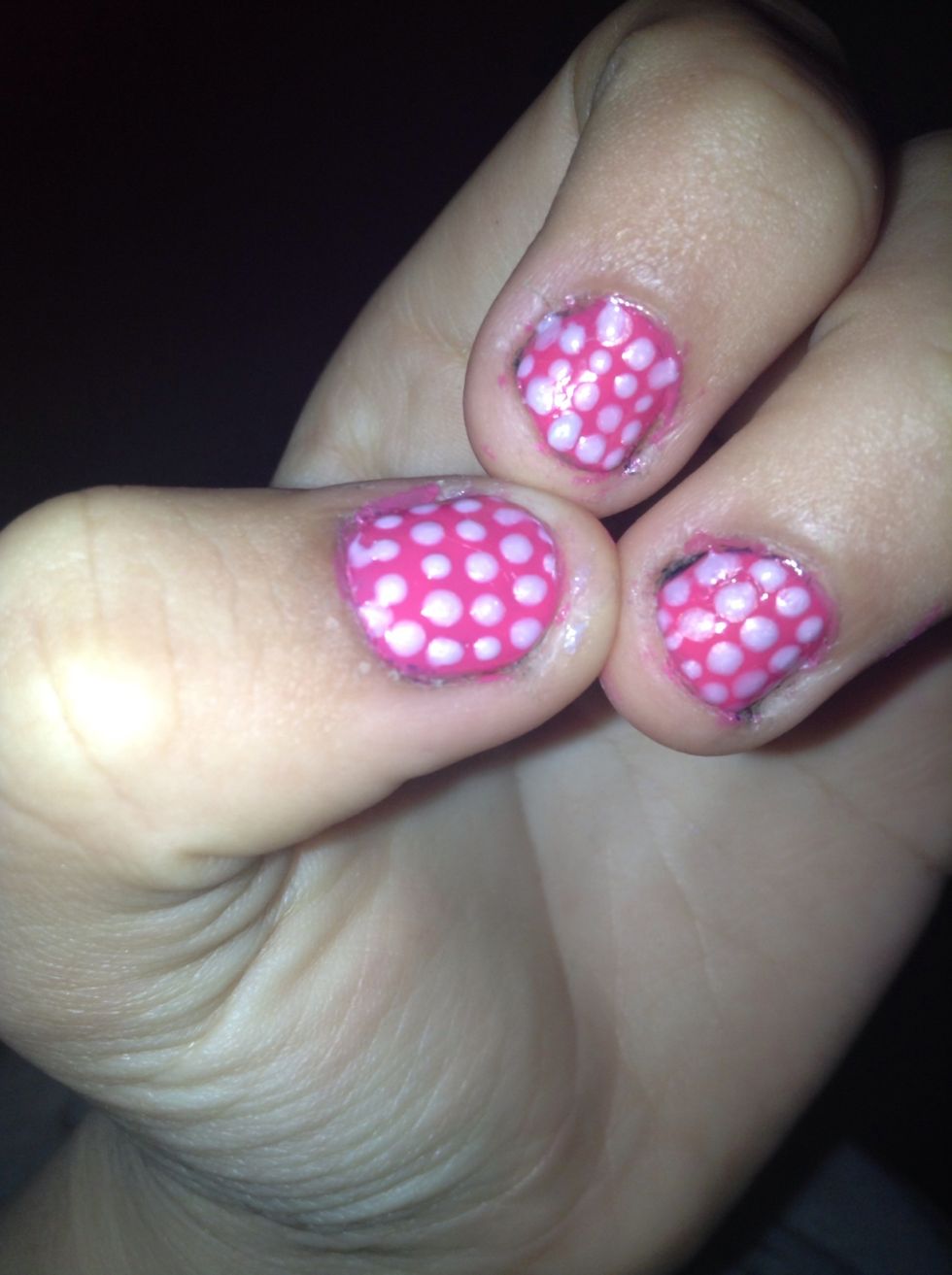 Put a base coat on then after that use a pin and with a different color dip the pin and make dots in rows or going diagonal