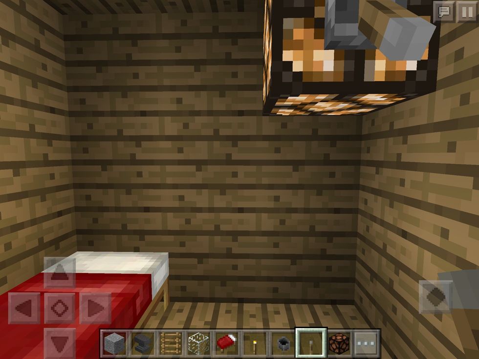 Put a bed a red stone lamp and a lever on the red stone lamp