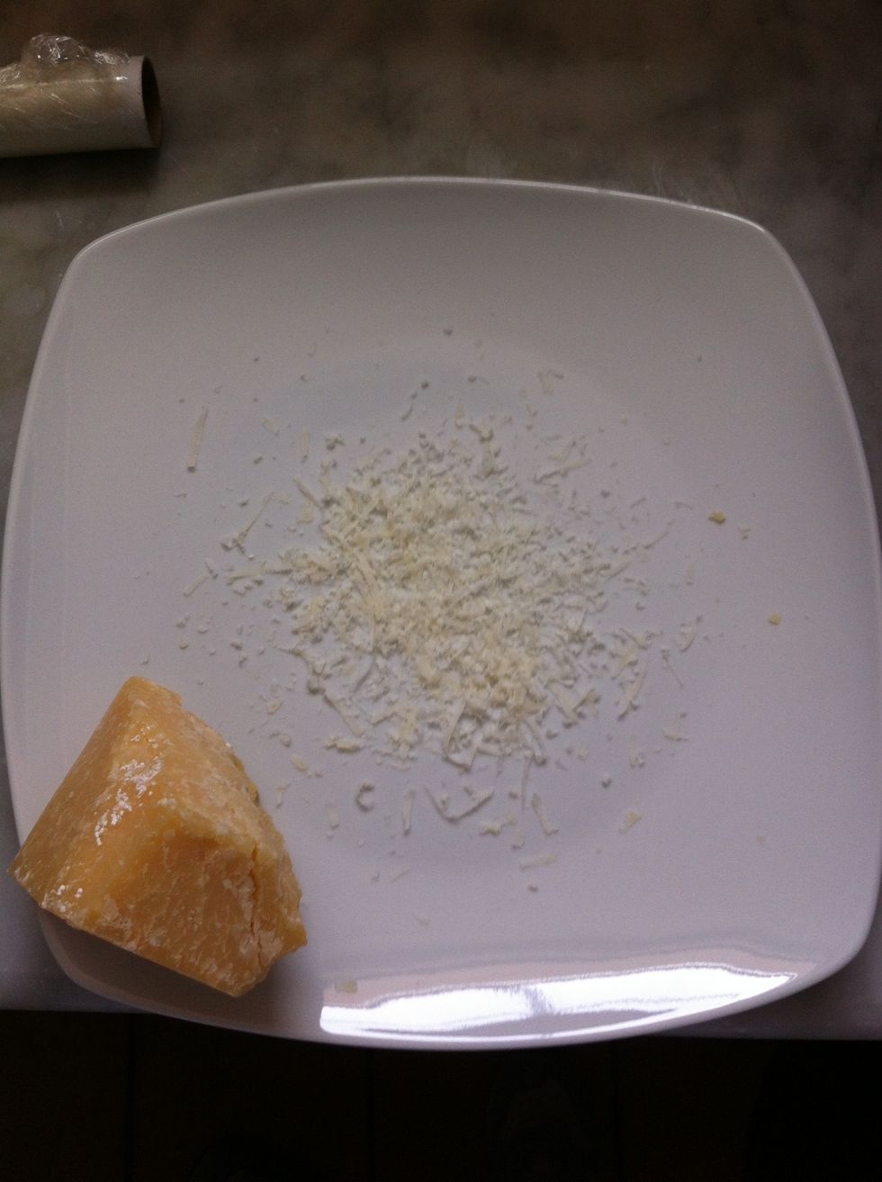 Put a bit of pecorino cheese on the base of the dish.