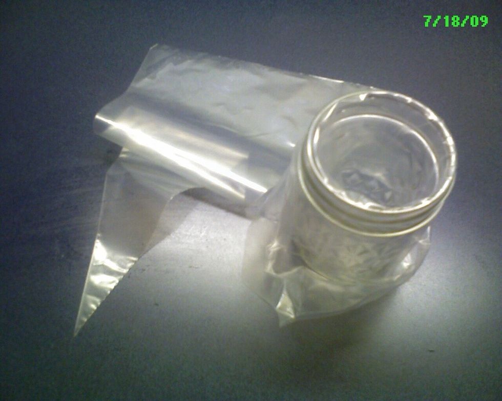 Put a "carrot" bag in a jar so it will stand up. This could be any plastic bag. After mixing we will cut out the corner, so filling the application bottle will be very easy.