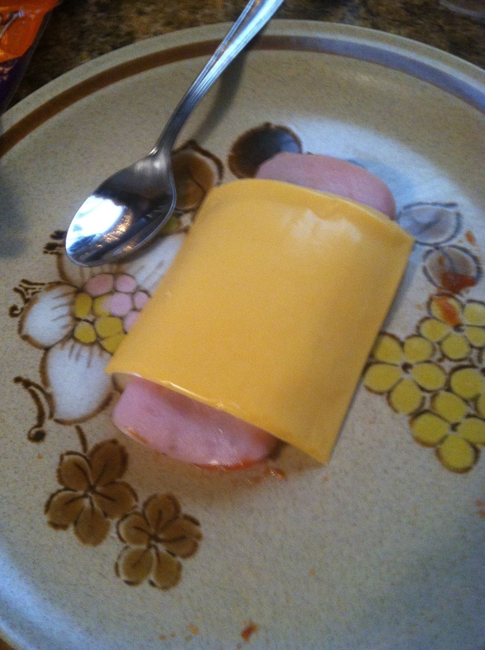 Put a cheese slice on top