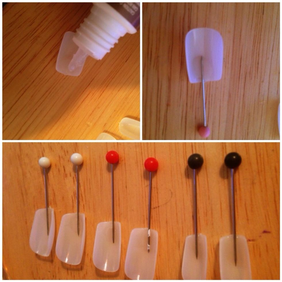 Put a dot of CRAPPY nail glue that comes off easily on the TOP OF THE NAIL. This is so the pin comes off easy later. Add pin. Repeat. I like to match pin colors to correlating nails.