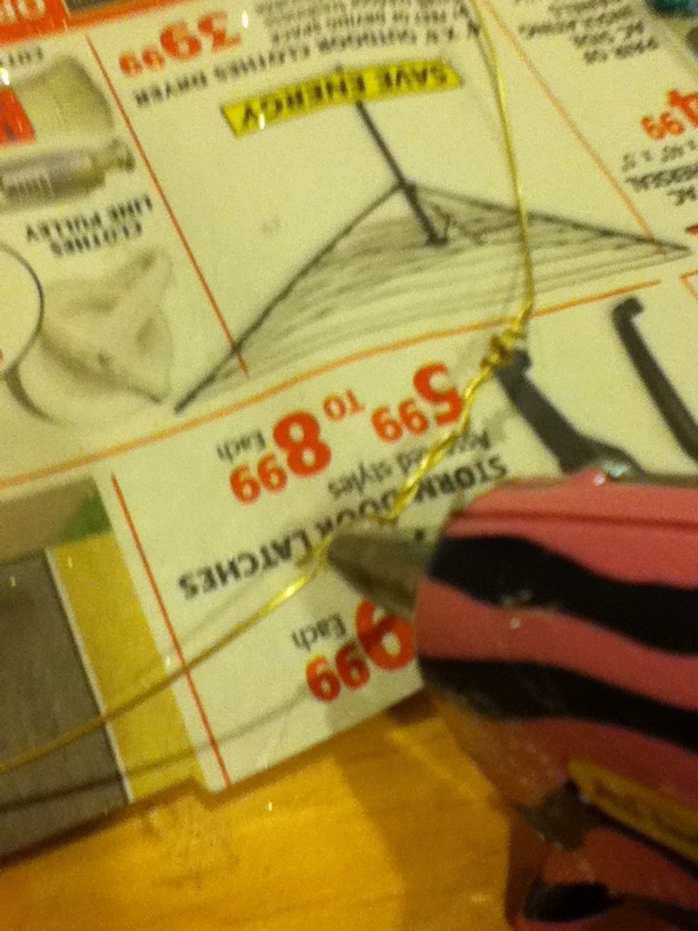 Put a drop of glue on it