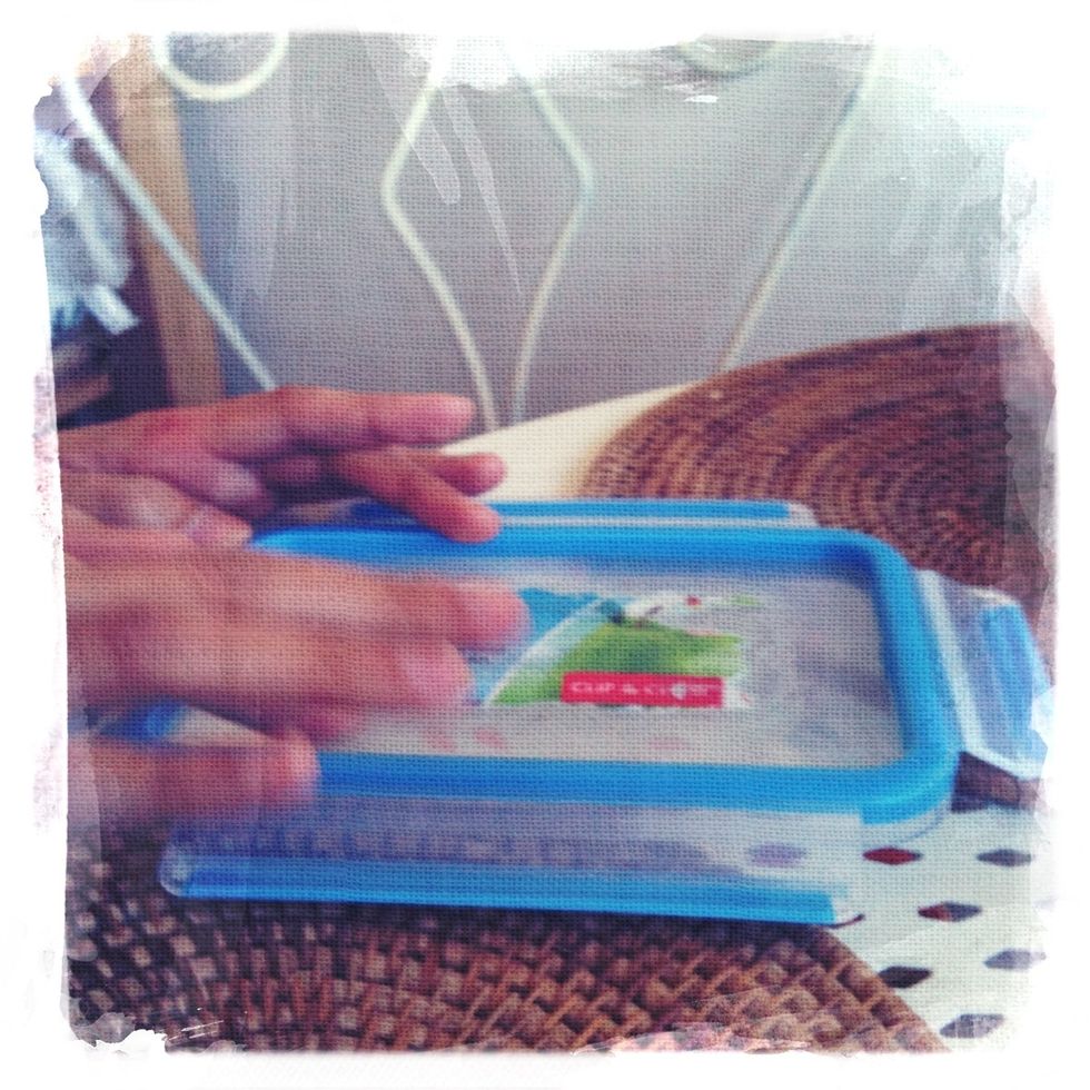Put a drop or two in cotton ball or tissue or even your finger and spread it evenly at the sticker