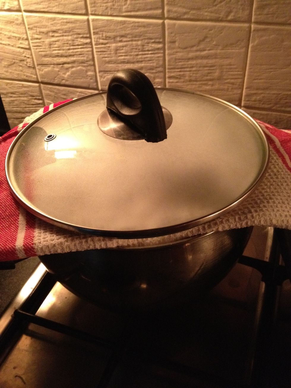 put a dry, clean, absorbent cloth, tea towel or whatnot on top of pot, and put top back on, turn off gas and leave alone for 10 minutes or so. this draws out any excess moisture.