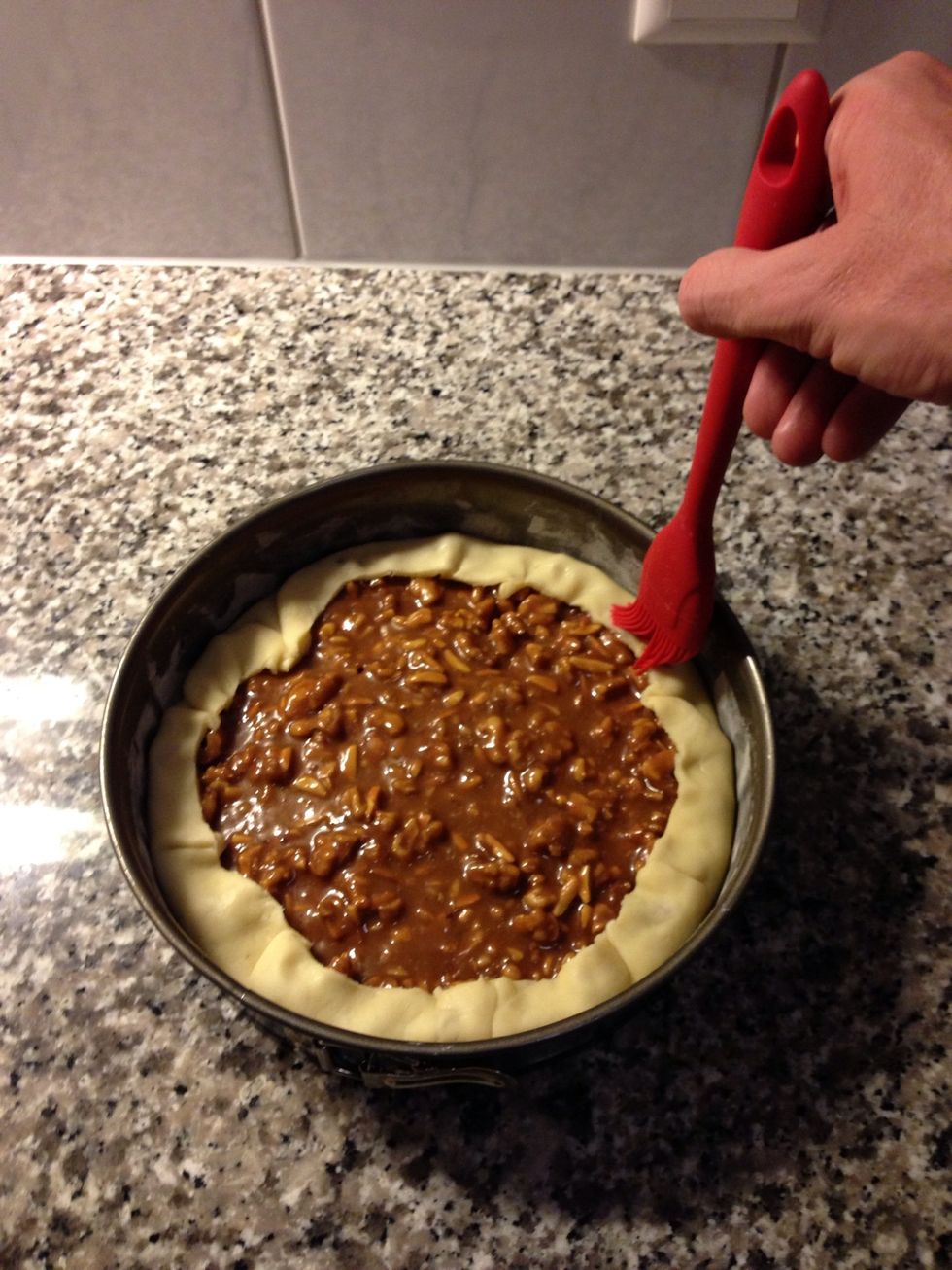 Put a few drops of water on the border of the pastry.