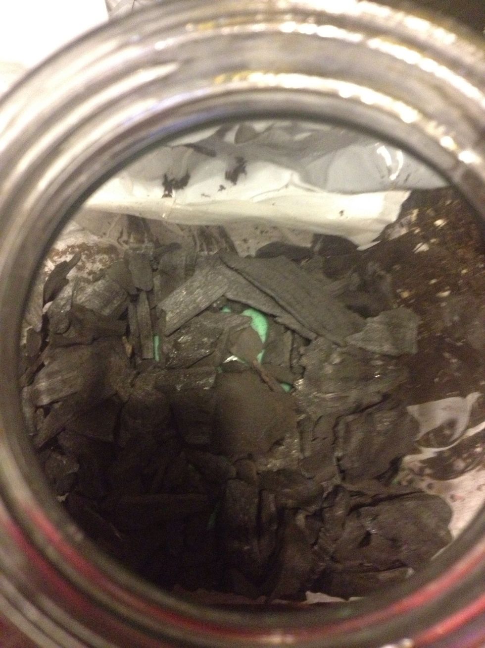 Put a layer of charcoal next. This helps keep the jar mould-free. I bought a bag from a garden centre for about $8 which was enough for 10-15 jars.