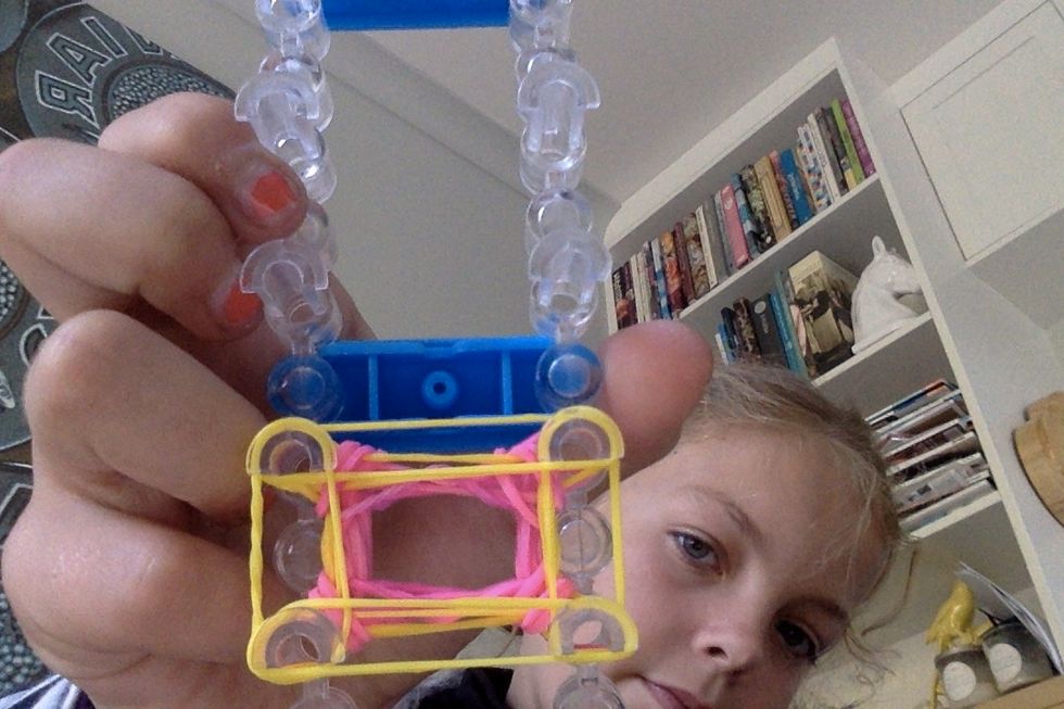 Put a layer of yellow rubber bands on top of that.