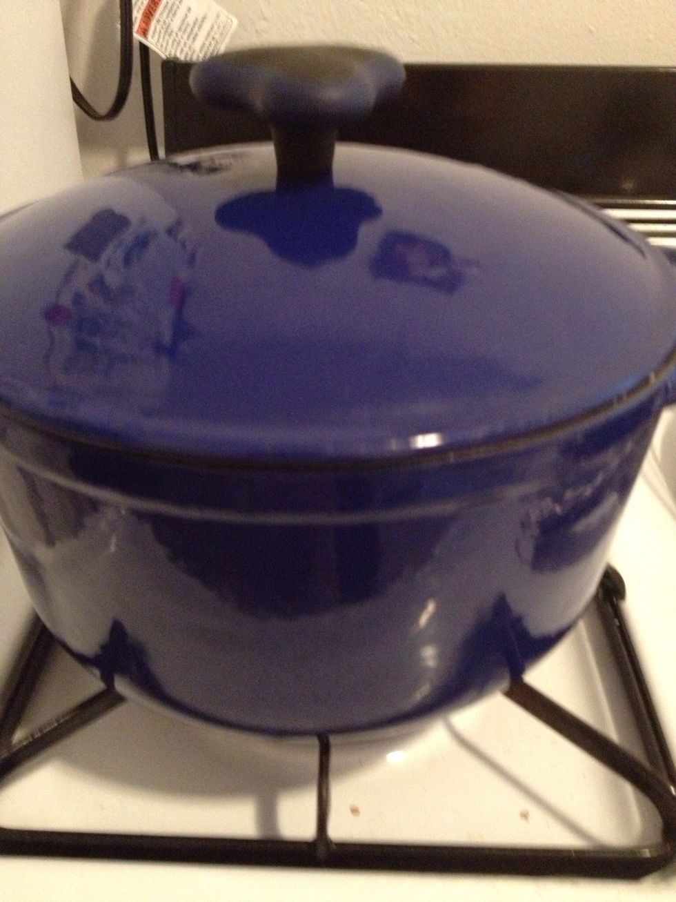 Put a lid on it and bake in oven set at 350 degrees until everything is bubbly (about 15 minutes). Uncover and bake for a few minutes if you like it really crunchy on top.