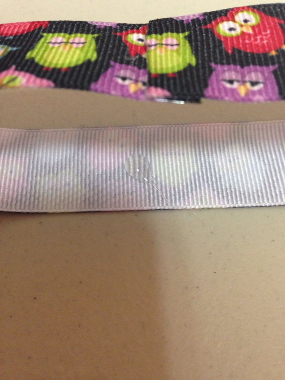 Put a little bit of glue on the inside