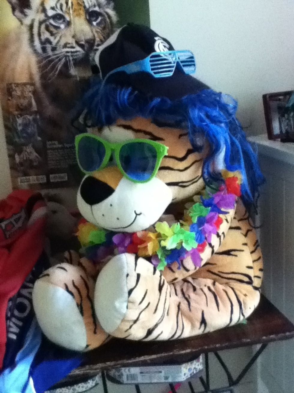 Put a pair of funky glasses on his eyes