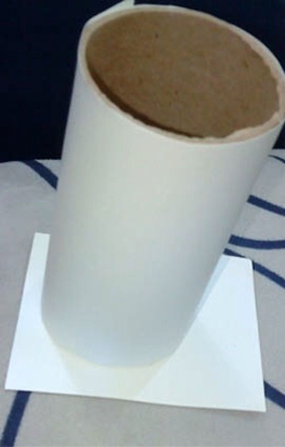 Put a paper under the roller then cut the paper on the size of the roller base