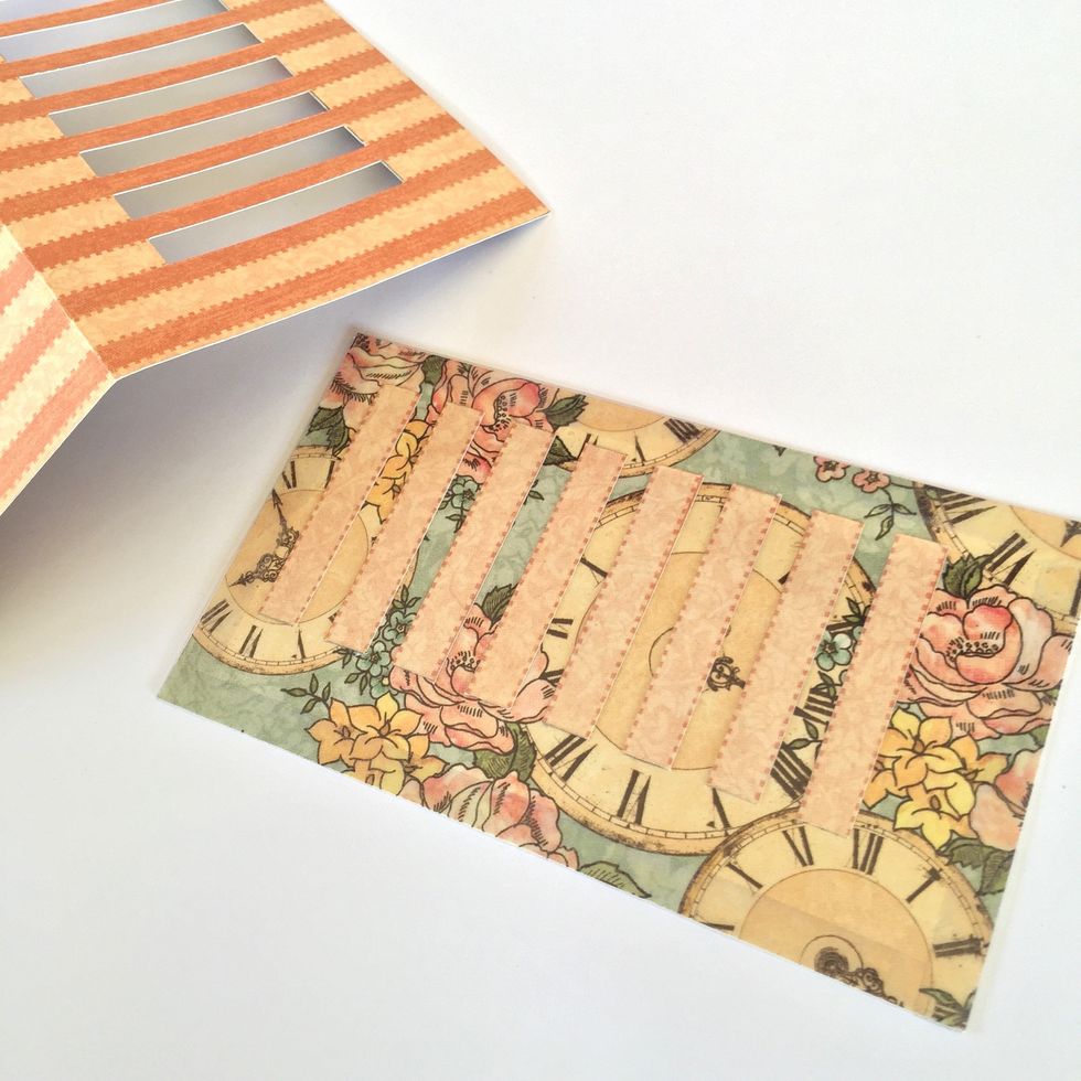 Put a piece of acetate on the card/tag and another one on the inside of the page. It will move better that way.