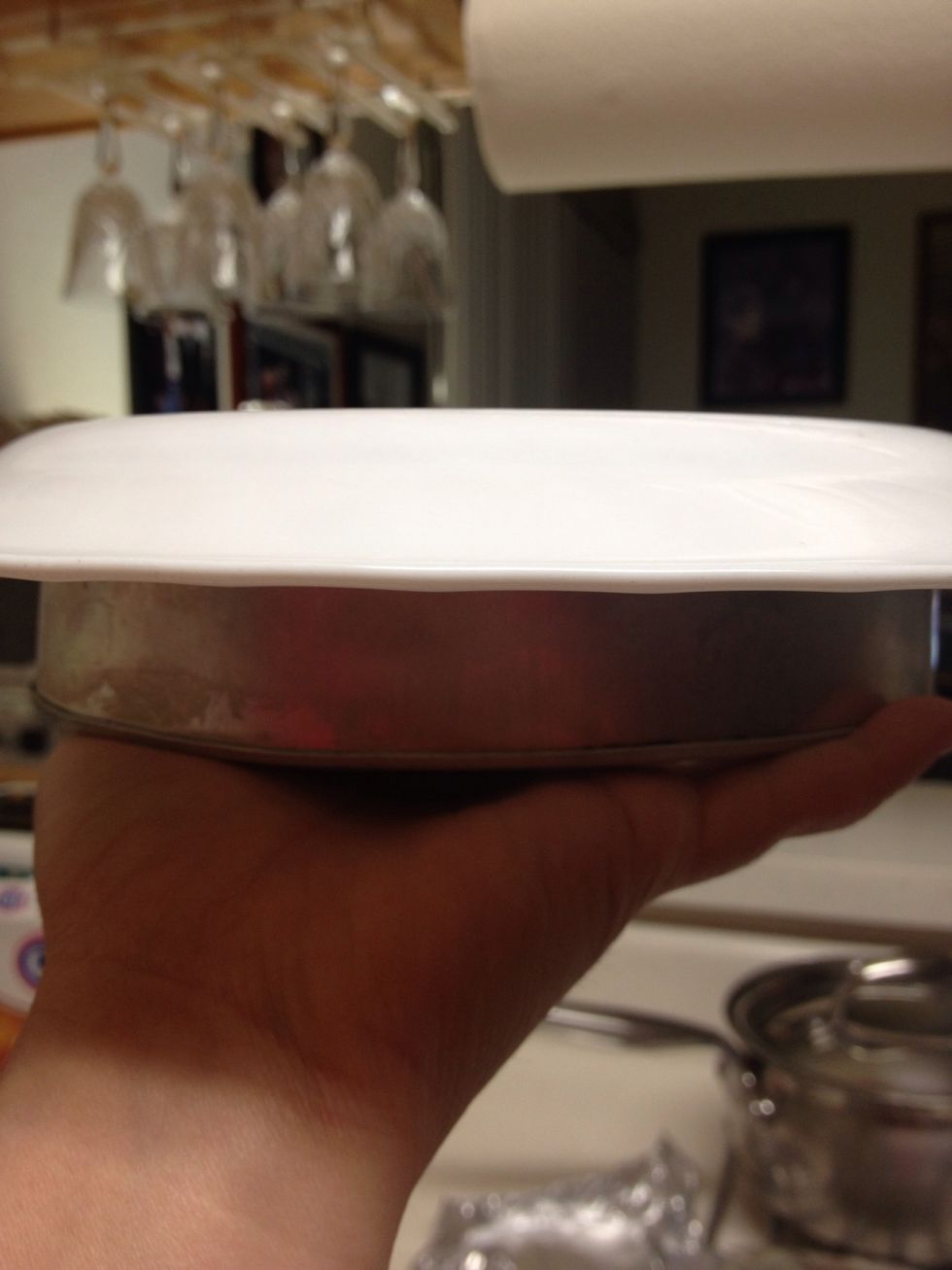 Put a plate on top, cuz we're putting it upside down