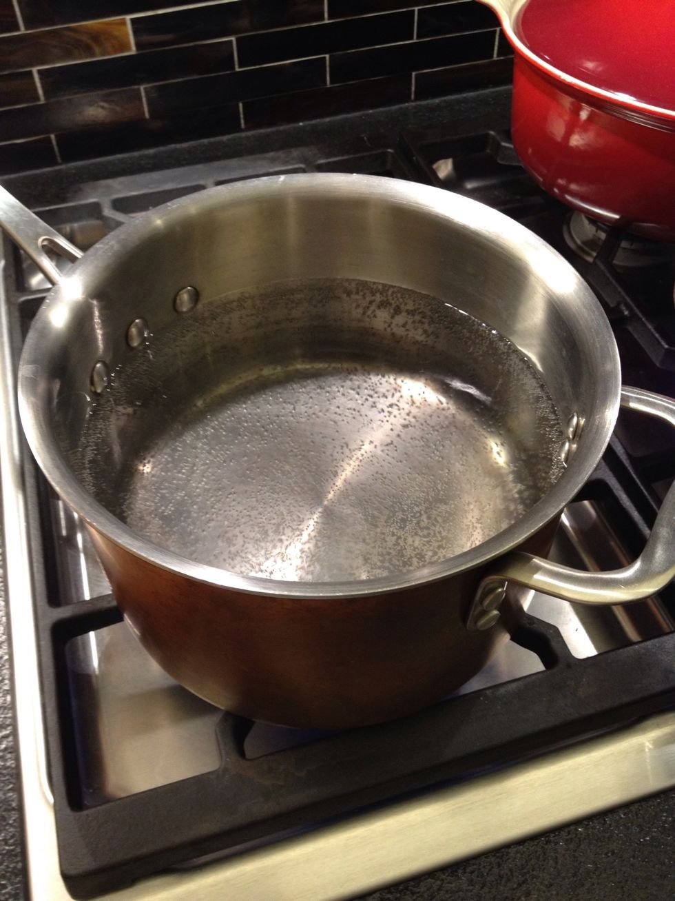 Put a pot of water on the fire