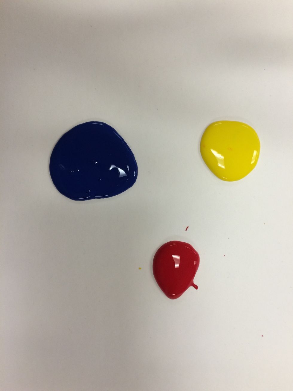 Put a quarter sized amount of red, yellow and blue on your scrap paper.