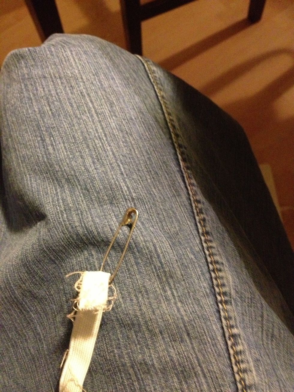 Put a safety pin at the top of your elastic. This will give you something to grip as you wiggle it through.