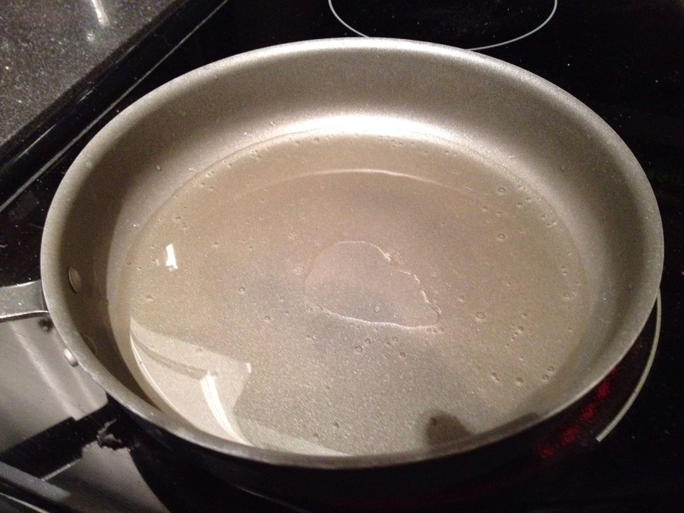 Put a significant amount of oil in a skillet and heat on high/medium.