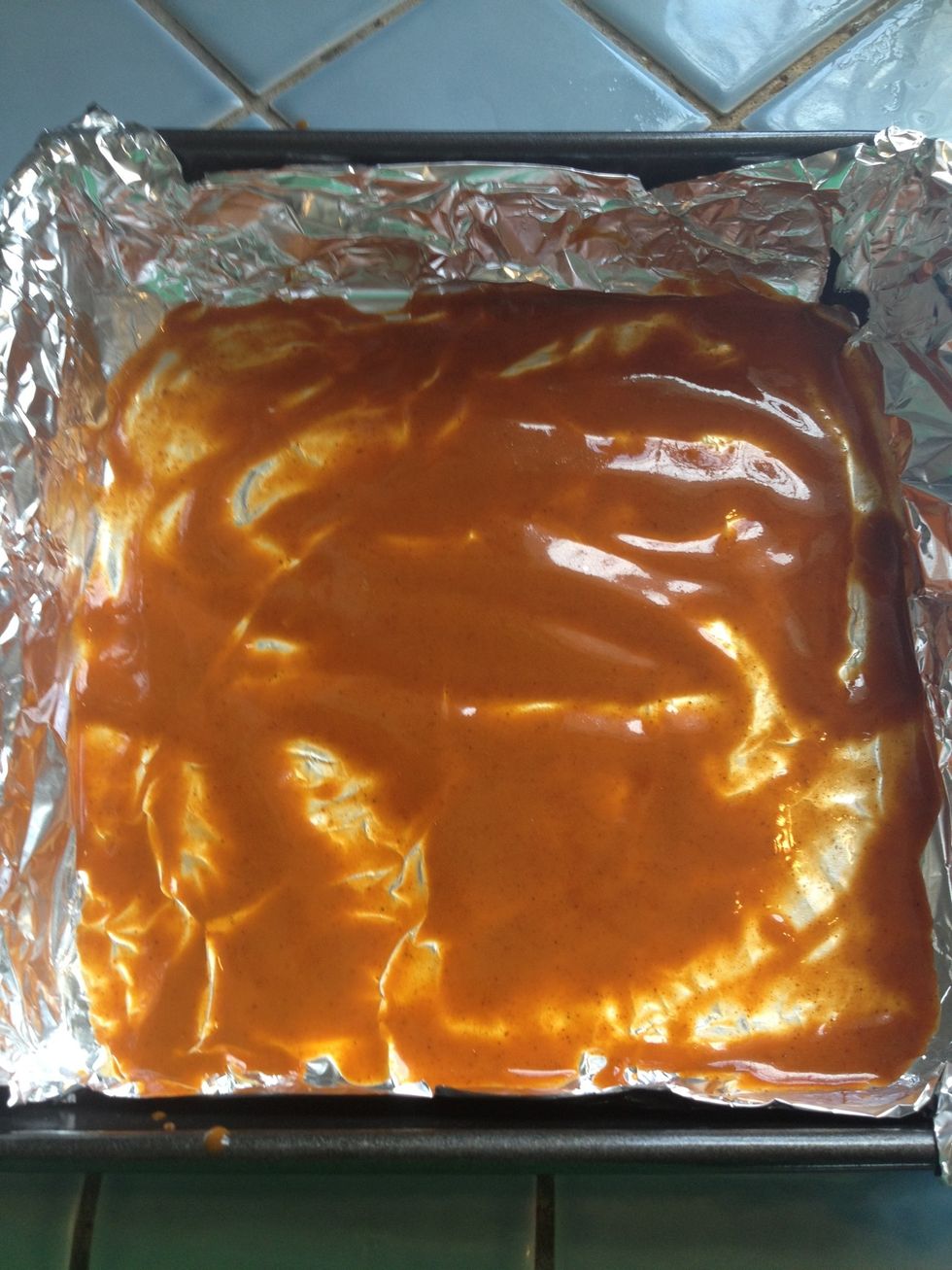 Put a small amount of the enchilada sauce in your pan so that your enchiladas don't stick.
