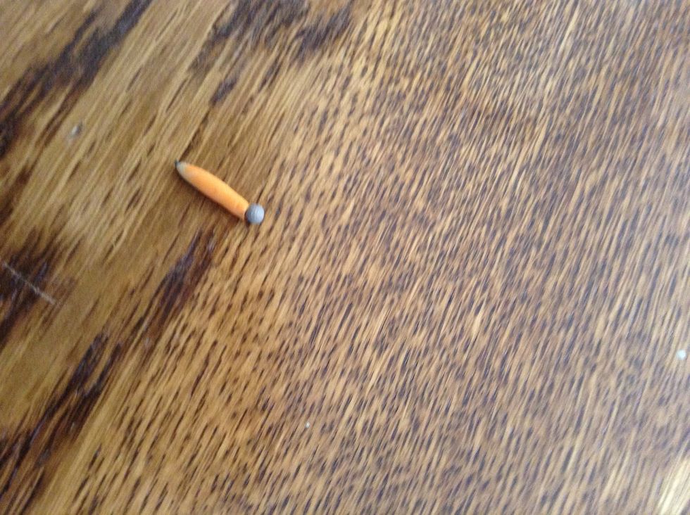 Put a small ball on your pencil