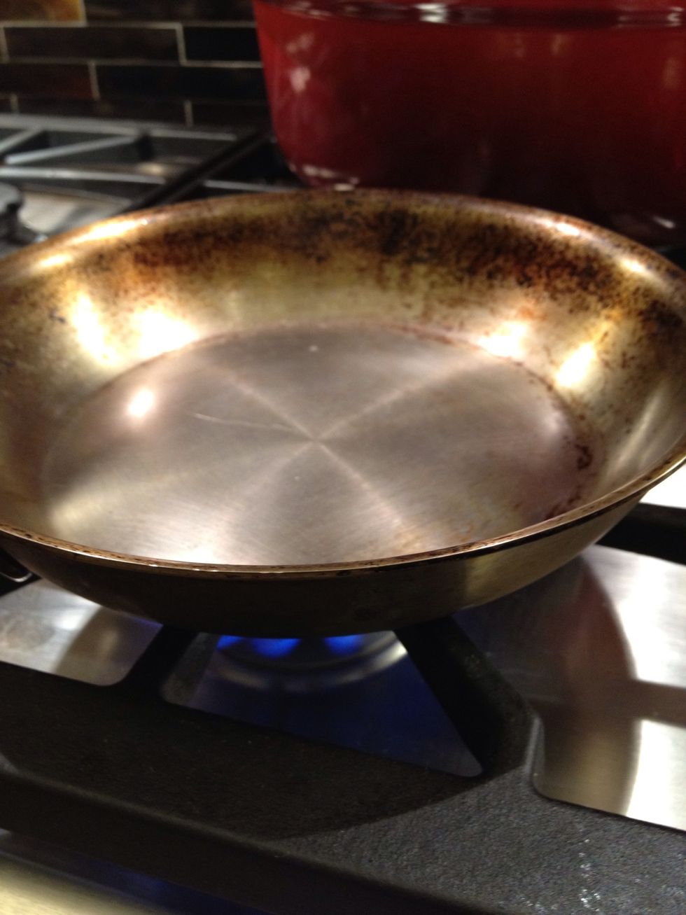 Put a small pan on the fire