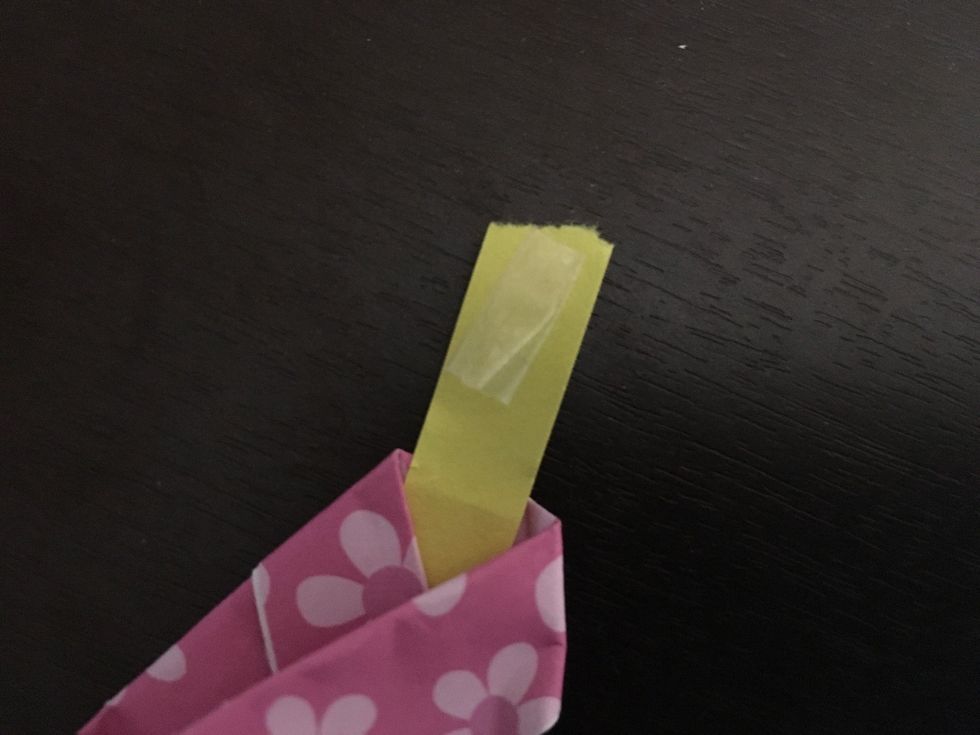 Put a small piece of tape on the end of the star paper