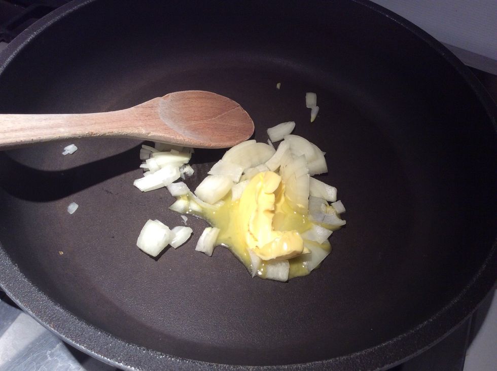 Put a table spoon of butter into your flat pan and add onions for browning