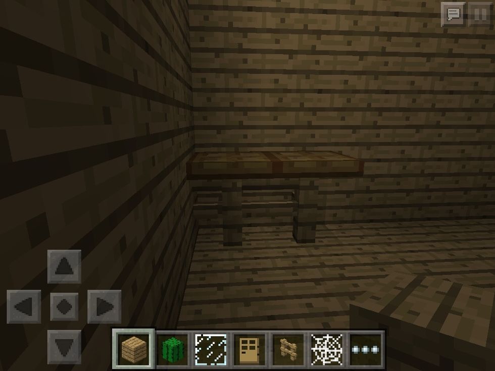Put a table with a fence and a trapdoor or carpet.