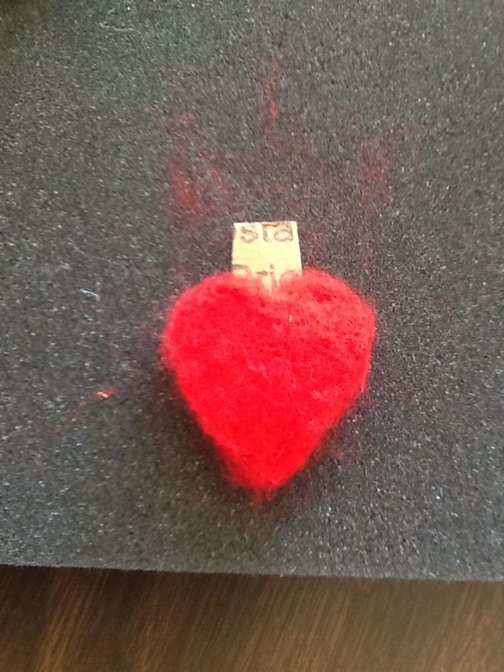 Put a thick piece of card board between the two hearts.