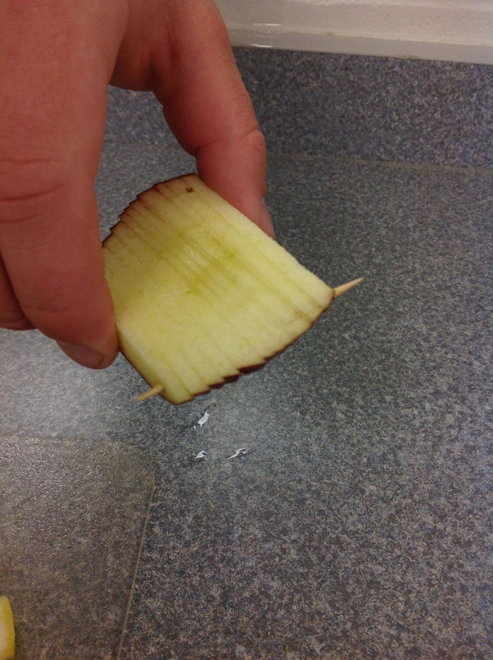 Put a toothpick threw the side of the slices to connect all of them