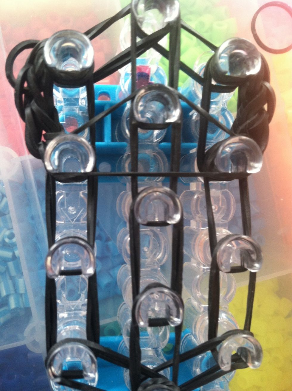 Put a triangle cap band on the second pegs down from the first one