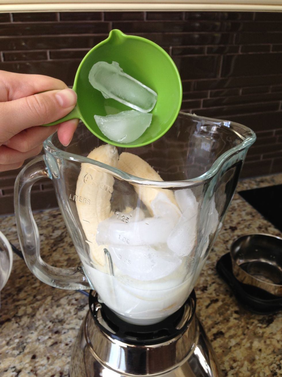 Put about a cup and a half of ice cubes in blender
