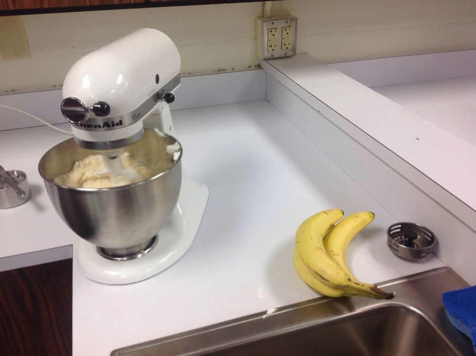 Put all ingredients besides bananas and nuts in mixer and mix.