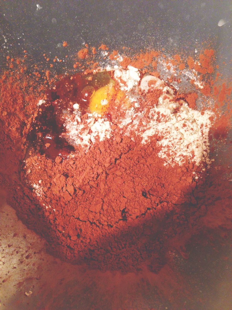 Put all ingredients (for the cake) in a bowl and mix until even